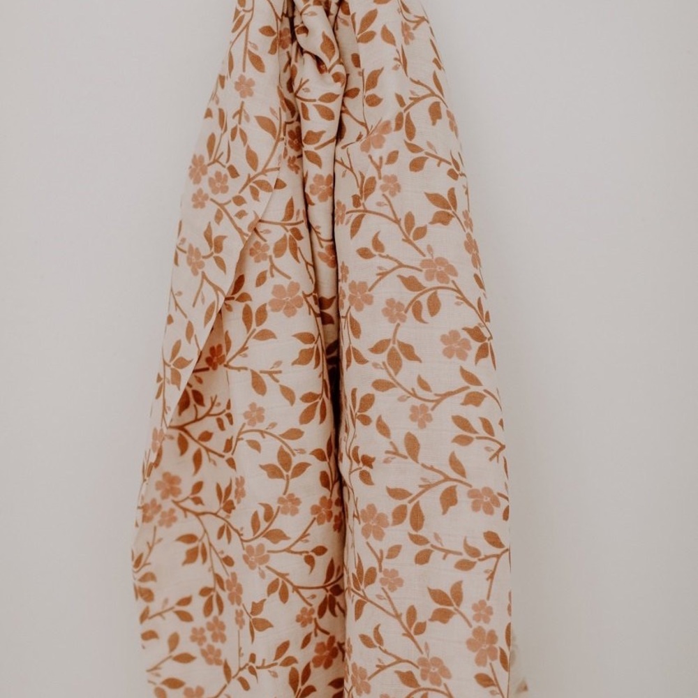 The mini scout magnolia tree swaddle muslin